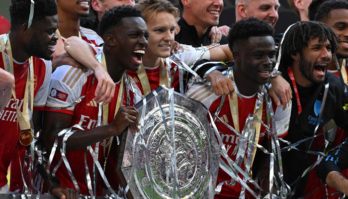 Arsenal players celebrate winning the English FA Community Shield football match between Arsenal and Manchester City at Wembley Stadium, in London, on August 6, 2023. Arsenal won after a 4-1 penalty shoot-out win, following the 1-1 draw in 90 minutes.—AFP