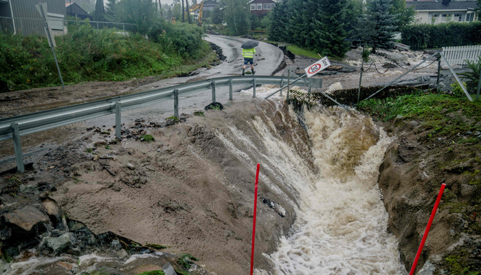 A stream overflowed its banks at Gran in southeastern Norway on August 8, 2023. — AFP