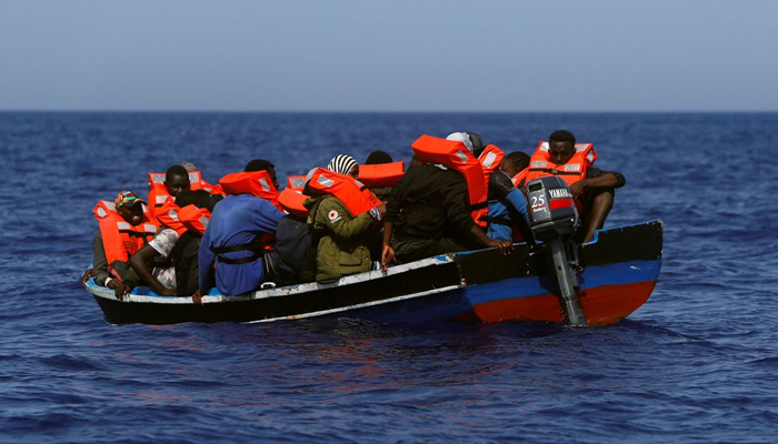 Migrants in a small wooden boat wait to be rescued by the German NGO migrant rescue ship Sea-Watch 3 in international waters off the coast of Libya, in the western Mediterranean Sea, August 1, 2021. — Reuters
