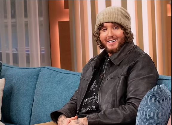 Former X Factor winner James Arthur opens up about wearing a beanie in summer