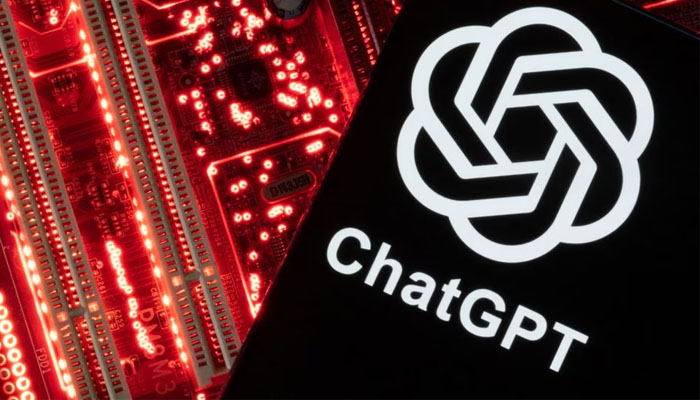 A smartphone with a displayed ChatGPT logo is placed on a computer motherboard in this illustration. — Reuters/File