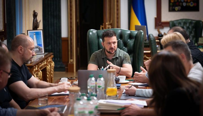 This photograph released on July 24, 2023, shows President Volodymyr Zelensky (c) chairing an official meeting. — Instagram/zelenskiy_official