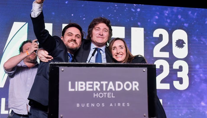 Argentine presidential candidate of the La Libertad Avanza alliance, Javier Milei, reacts with Ramiro Marra, candidate for head of government of Buenos Aires, and Victoria Villarruel, candidate for vice-president, on stage at his campaign headquarters on the day of Argentinas primary elections, in Buenos Aires, Argentina — Reuters