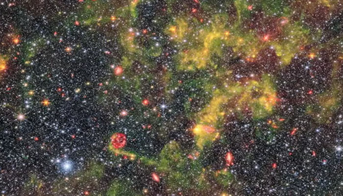 The image shows the irregular galaxy NGC 6822 observed by the Near-InfraRed Camera (NIRCam) and Mid-InfraRed Instrument (MIRI) mounted on the NASA/ESA/CSA James Webb Space Telescope. — NASA/File