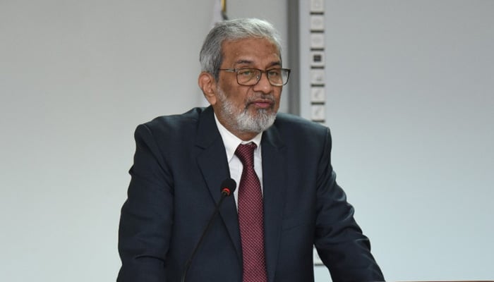 Justice (retd) Maqbool Baqar speaks during a ceremony at theFederal Judicial Academy in Islamabad. —Federal Judicial Academy