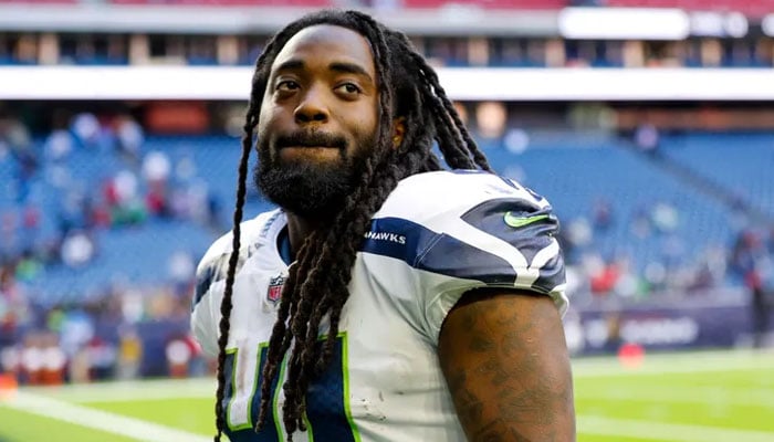 The image shows former Seattle Seahawks and Baltimore Ravens running back Alex Collins. — Twitter/File