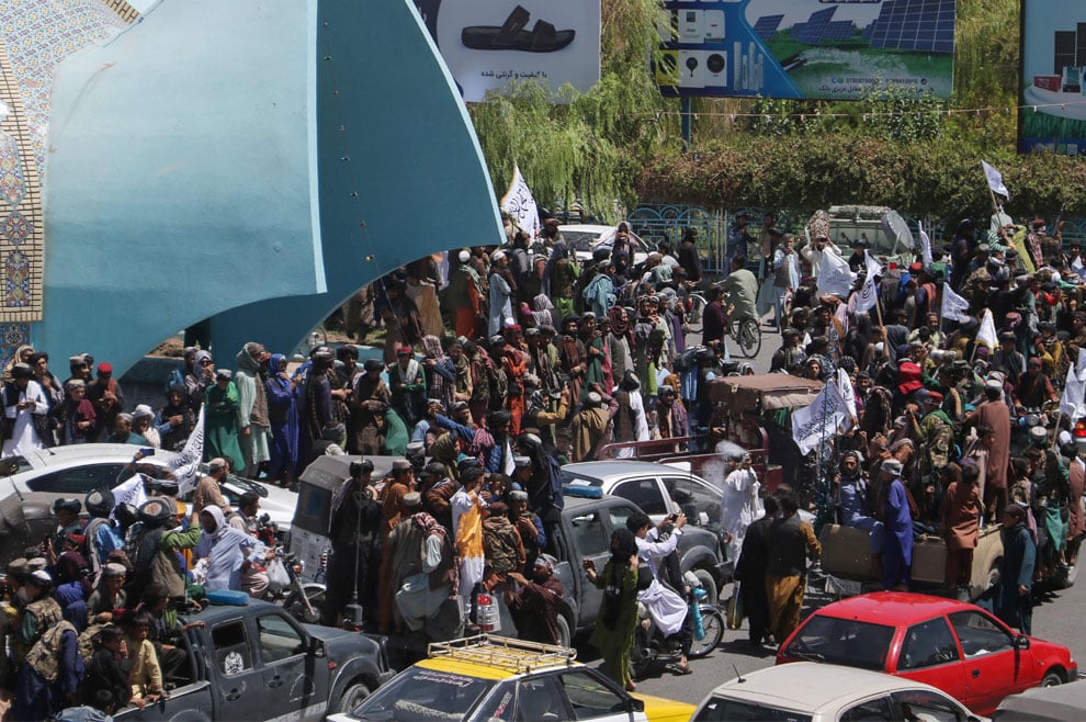 Taliban security personnel ride on vehicles as they celebrate the second anniversary of their takeover in Herat on August 15, 2023. — AFP