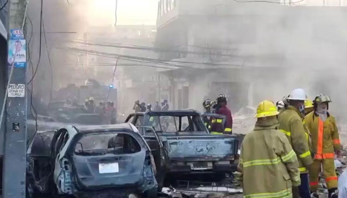 Emergency services personnel at the site of an explosion in a building, in San Cristobal, Dominican Republic August 14, 2023, in this screen grab obtained from social media video.—Reuters