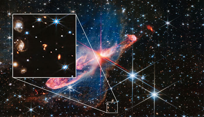 The question mark-shaped object could be the interaction of two galaxies, experts said. — Nasa