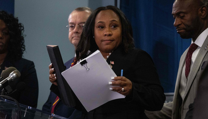 District Attorney Fani Willis holds a press conference in the Fulton County Government Center after a grand jury voted to indict former US President Donald Trump and 18 others on August 14, 2023, in Atlanta, Georgia. — AFP