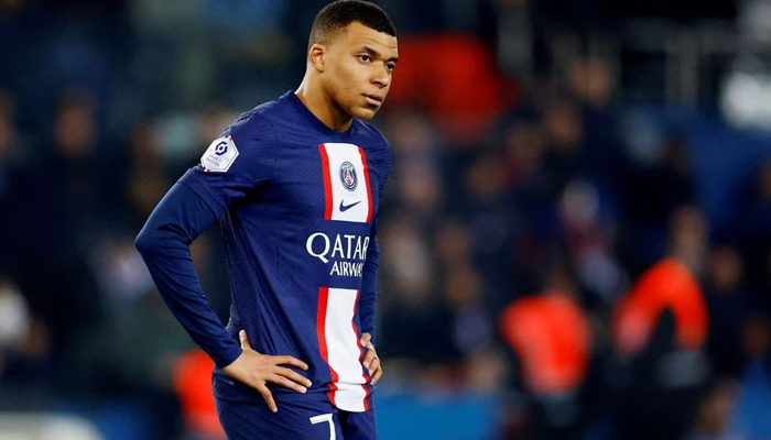 This picture taken on April 2, 2023, shows Paris St Germain forward Kylian Mbappe as he looks dejected after the match. — Reuters