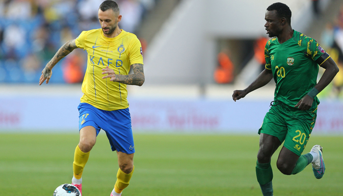 Nassrs midfielder Marcelo Brozovic (L) vies for the ball with Shortas forward Idrissa Niang during the 2023 Arab Club Champions Cup semi-final in Abha on August 9, 2023. — AFP