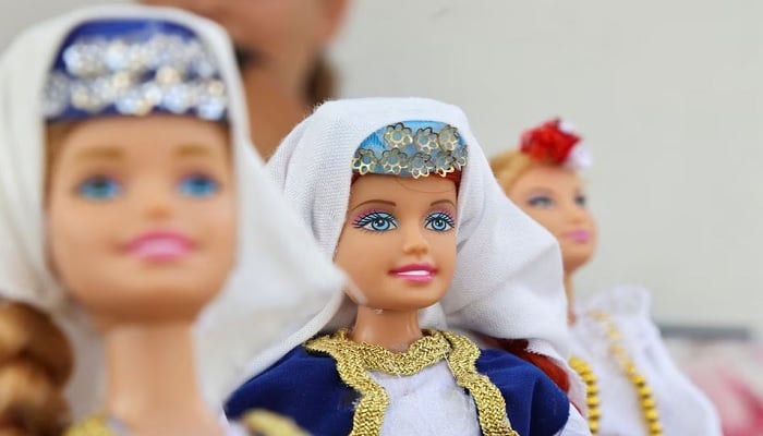 Dolls are displayed dressed in Bosnias traditional folklore costumes made by 11-year-old Bosnian girl Esma Gljiva, who hopes that her folklore Barbie will reach many, as the frenzy surrounding the launch of the Barbie movie spreads across the world, in Sarajevo, Bosnia and Herzegovina, August 15, 2023. — Reuters