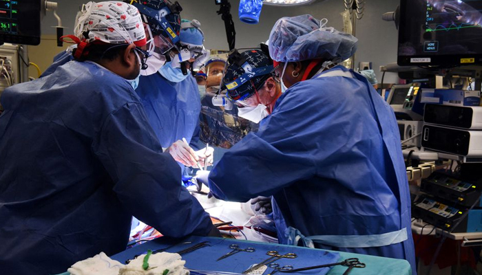 A team conducts a successful transplant of a genetically-modified pig heart on a 57-year-old patient with terminal heart disease, at the University of Maryland Medical Center on January 7, 2022. — Reuters