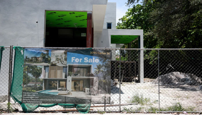 A for sale sign in front of a home under construction in Miami in July. nbcnews.com
