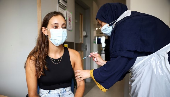 A person receives a dose of vaccine at the Central Middlesex Hospital in London, Britain, August 1, 2021. — Reuters/File