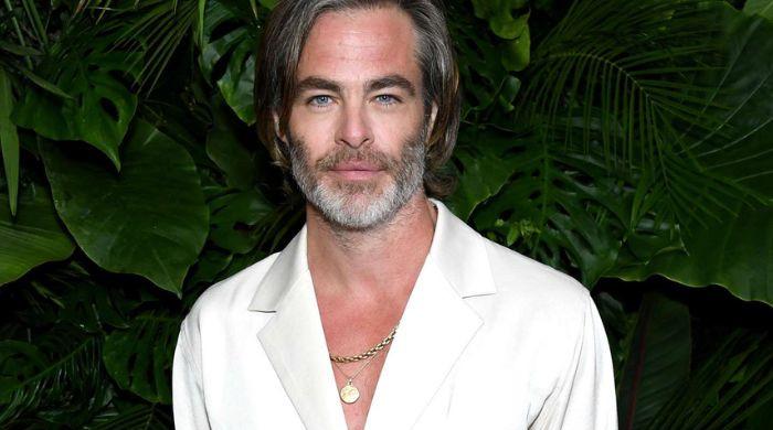 Chris Pine looks dashing while partying on yacht with mystery woman