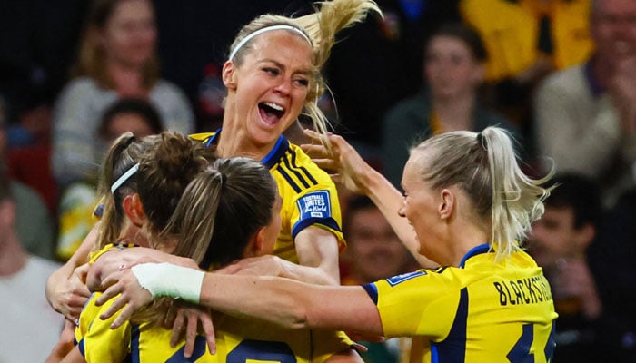 Sweden players celebrate scoring their second goal during the Australia and New Zealand 2023 Women´s World Cup third-place play-off football match between Sweden and Australia at Brisbane Stadium in Brisbane on August 19, 2023.—AFP