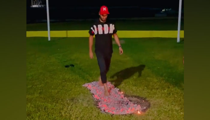 Bangladeshs Mohammad Naim Sheikh walks on fire, — X/@saifahmed75