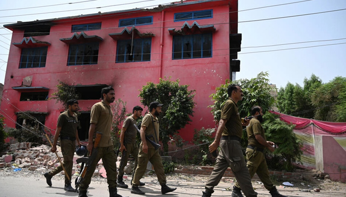 Police patrol by a Salvation Army church in Jaranwala that was torched by a mob in protests over alleged blasphemy, in this undated photo. — AFP/File