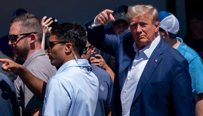 Former US President and 2024 Presidential hopeful Donald Trump attends the Iowa State Fair in Des Moines, Iowa, on August 12, 2023. — AFP