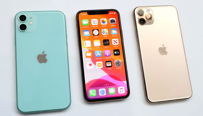 Apple iPhone 11 (L) and iPhone 11 Pro (R) are displayed during an Apple special event on September 10, 2019, in Cupertino, California. — AFP