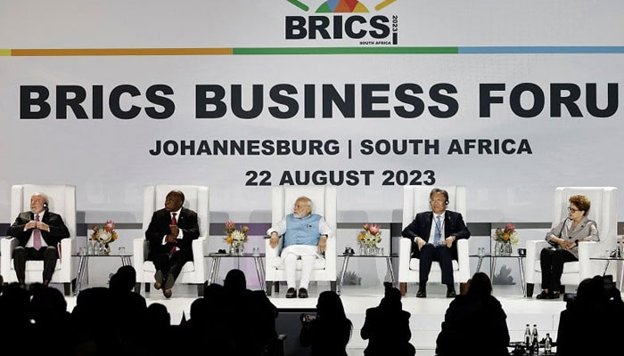 (From L to R) President of Brazil Luiz Inacio Lula da Silva, South African President Cyril Ramaphosa, Prime Minister of India Narendra Modi and Chinas Minister of Commerce Wang Wentao attend the 2023 BRICS Summit at the Sandton Convention Centre in Johannesburg on August 22, 2023. AFP