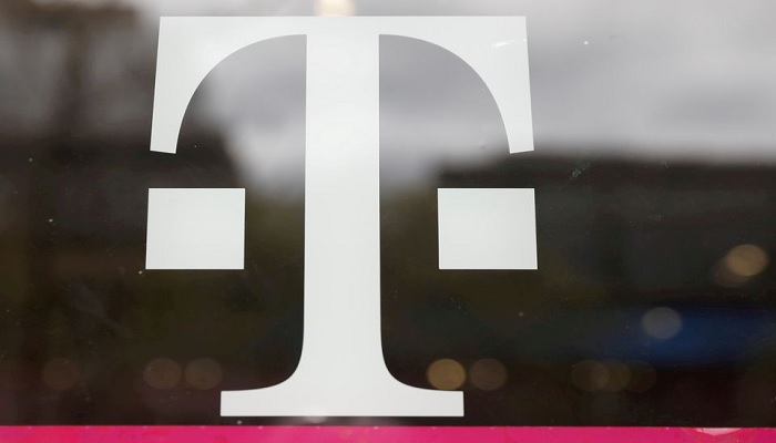 A T-Mobile logo is seen on the storefront door of a store in Manhattan, New York, U.S., April 30, 2018.— Reuters/File