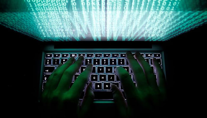 A man types on a computer keyboard in this illustration picture taken February 28, 2013. — Reuters