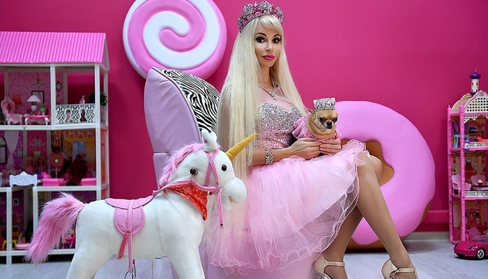 Russian Barbie doll collector Tatiana Tuzova dressed as Princess Barbie. — Reuters