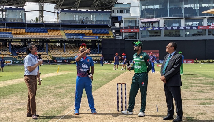 Skippers Babar Azam and Hasmatullah during the toss on August 26, 2023. — PCB