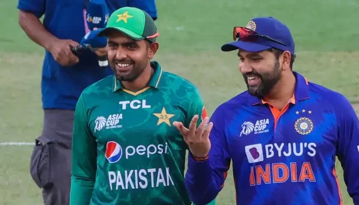 Pakistan captain Babar Azam (L) and India captain Rohit Sharma (R) before their match in T20 Asia Cup 2022. — ACC