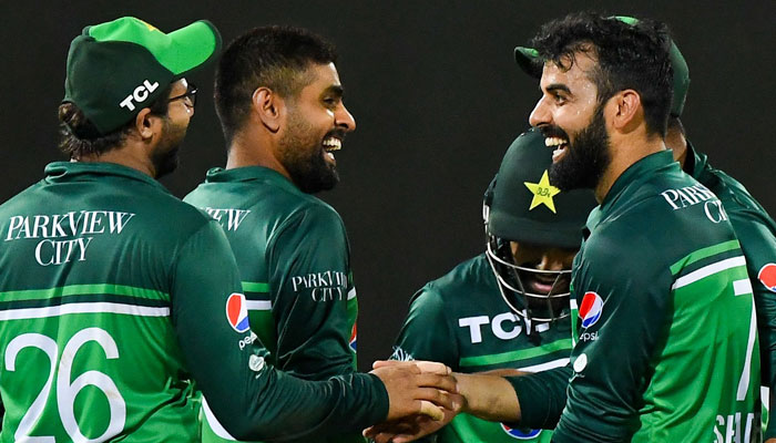 Pakistan´s captain Babar Azam (2L) celebrates with teammates after the dismissal of Afghanistan´s Hashmatullah Shahidi (not pictured) during the third and final one-day international (ODI) cricket match between Pakistan and Afghanistan at the R. Premadasa Stadium in Colombo on August 26, 2023. — AFP