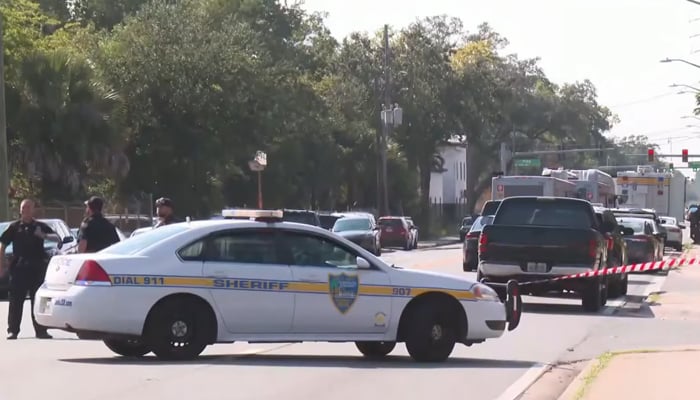 Police officers and vehicles are at the crime scene after a mass shooting at Dollar General store in Jacksonville, Florida on August 26, 2023. — Screengrab/TouTube/NBC News