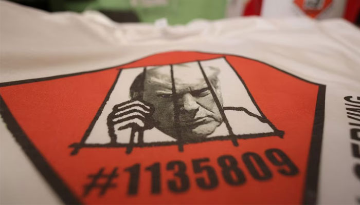 T-shirts and hats with an image depicting the mugshot of former President Donald Trump are pictured at the Y-Que printing store in Los Angeles, California, US, August 25, 2023. — Reuters/File