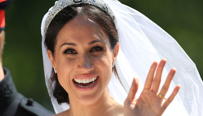 Meghan Markle sew her something blue secretly in wedding dress