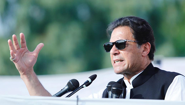 PTI chairman Imran Khan addressing a crowd at a public rally. — Twitter/Imran Khan