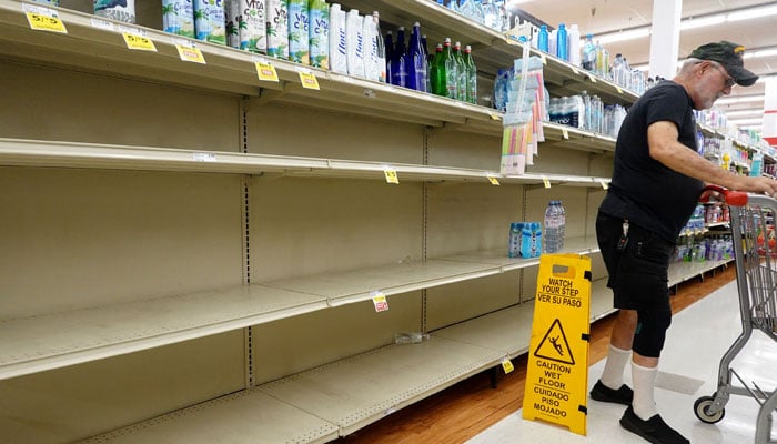 A grocery store´s water section is almost bare as people stock up ahead of the possible arrival of Hurricane Idalia on August 29, 2023 in Pinellas Park, Florida. AFP