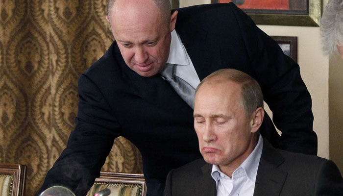 Wagner chief Yevgeny Prigozhin and Russias president Vladimir Putin. — Reuters
