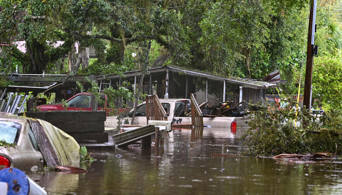 A backyard of a house is seen flooded in Steinhatchee, Florida on August 30, 2023, after Hurricane Idalia made landfall. Idalia barreled into the northwest Florida coast as a powerful Category 3 hurricane on Wednesday morning, the US National Hurricane Center said. Extremely dangerous Category 3 Hurricane #Idalia makes landfall in the Florida Big Bend, it posted on X, formerly known as Twitter, adding that Idalia was causing catastrophic storm surge and damaging winds. AFP