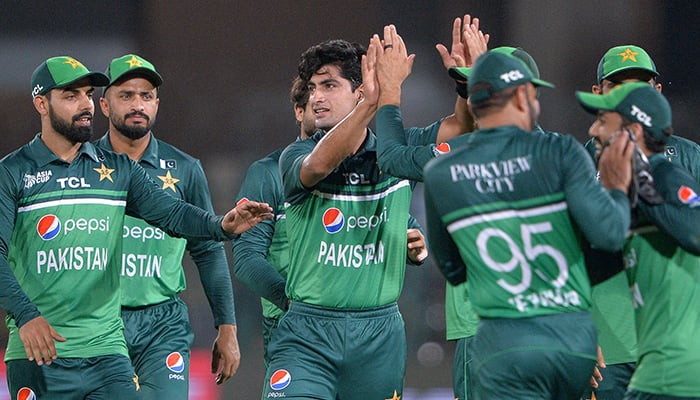 Pakistans Naseem Shah (C) celebrates with teammates after taking the wicket of Nepals Aasif Sheikh (not pictured) during the Asia Cup 2023 cricket match between Pakistan and Nepal at the Multan Cricket Stadium in Multan on August 30, 2023. — AFP
