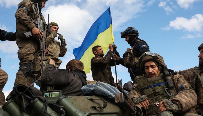 Ukrainian soldiers near Lyman, a key city in the eastern Donetsk region that Russian forces abandoned over the weekend to avoid encirclement. — AFP/File