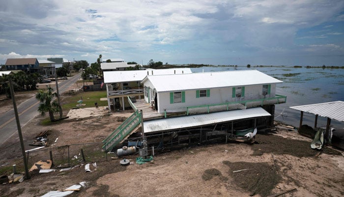 Storm debris is strewn about in the aftermath of Hurricane Idalia on August 31, 2023 in Keaton Beach, Florida. Idalia, which weakened to a tropical storm made landfall at Keaton Beach, Florida as a category 3 hurricane and caused heavy rain and flash flooding. AFP