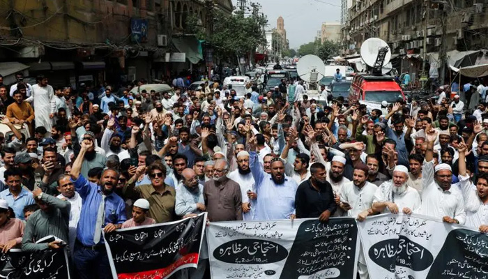 People protest against the hikes in fuel prices and electricity billings, in Karachi, Pakistan, August 18, 2023. — Reuters