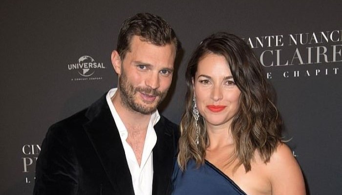 Jamie Dornan and wife Amelia Warner attend HAIM concert in London