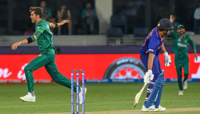 Shaheen Shah Afridi takes off after nabbing Rohit Sharma for a first-ball duck during the match at the Dubai International Stadium on October 24, 2021. — AFP