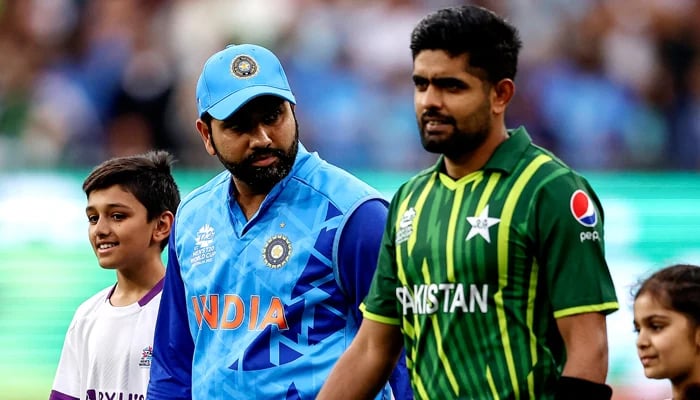 Rohit Sharma (left) and Babar Azam. — AFP/File