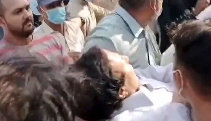 The Islamabad Capital Territory (ICT) police transporting Pakistan Tehreek-e-Insaf President Parvez Elahi from Lahore to the federal capital in this still taken from a video on September 1, 2023. X/ @MurtazaViews