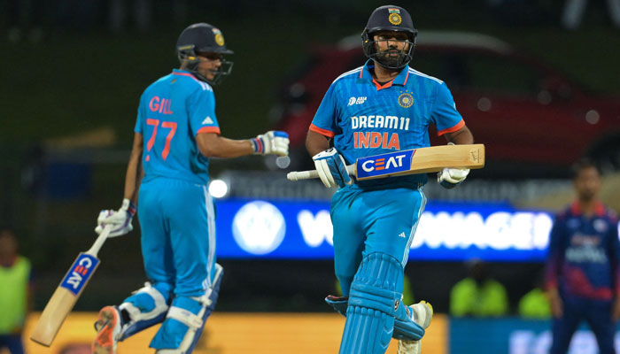 India’s captain Rohit Sharma (R) and Shubman Gill run between the wickets during the Asia Cup 2023 one-day international (ODI) cricket match between India and Nepal at the Pallekele International Cricket Stadium in Kandy on September 4, 2023. — AFP