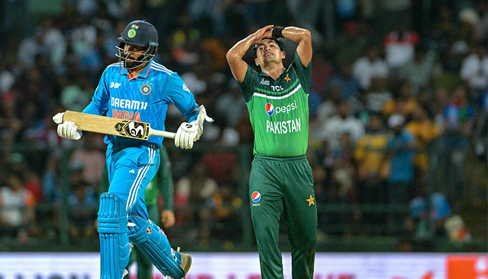 Pakistans Naseem Shah (R) gestures during the Asia Cup 2023 one-day international (ODI) cricket match between India and Pakistan at the Pallekele International Cricket Stadium in Kandy on September 2, 2023. — AFP